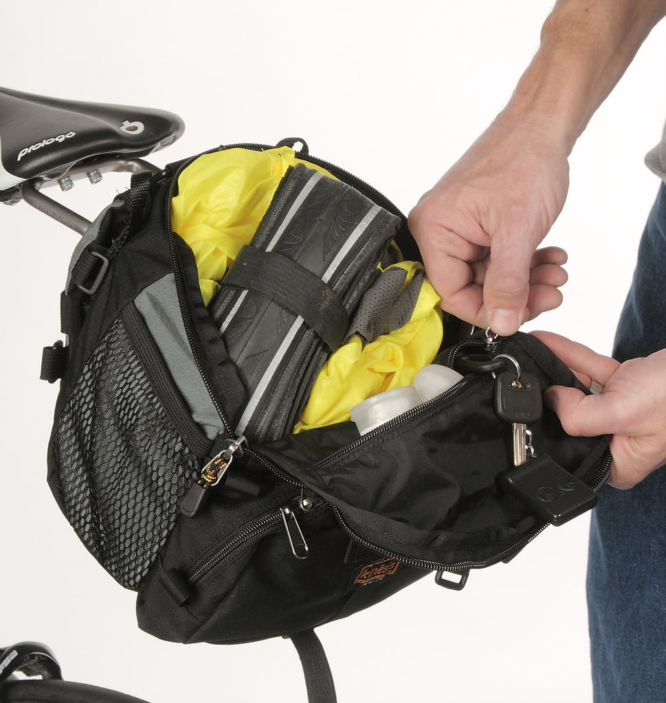 A zippered pocket under the main lid has room for small items, a brevet card and also has a lanyard for your car keys (black & gray color shown).
