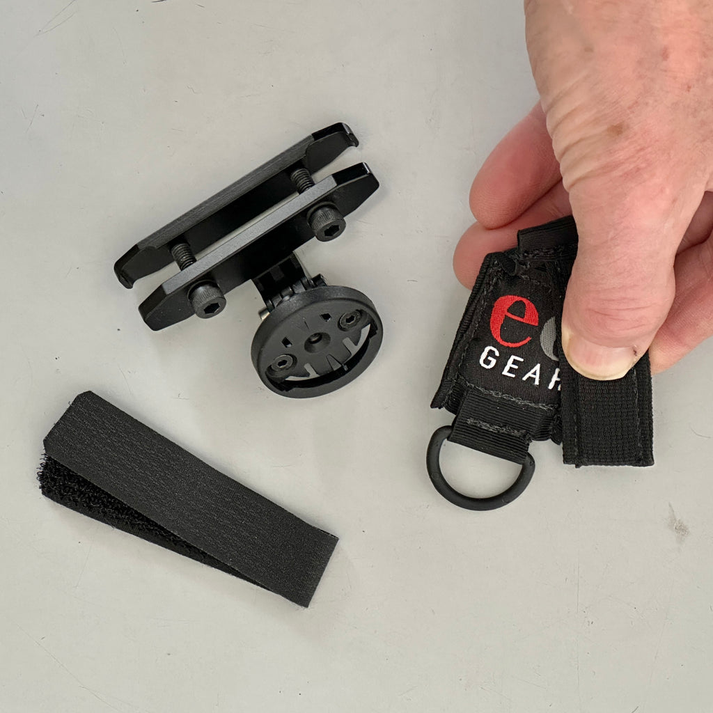 The bracket in the upper left, jaws in the lower right and the loose OmniTape piece.