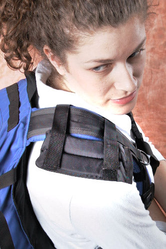Attach pad to side of Harness