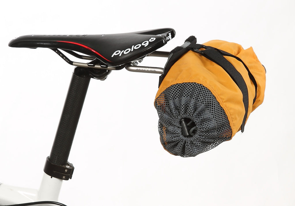A reasonably sized stuff sack can attach directly to the bracket w/o the use of a saddlebag.
