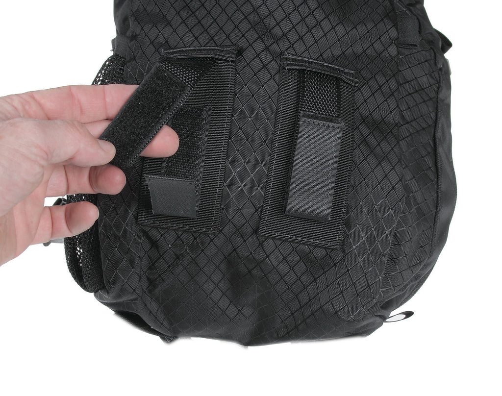 This bag has a pair of the Dual Tab System Velcro-like tabs on the back (DTS).
