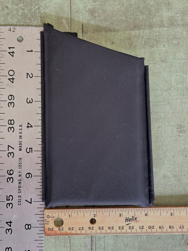 The V053 is a wonky-shaped divider. Not shown are the Velcro tabs, which are folded under. 