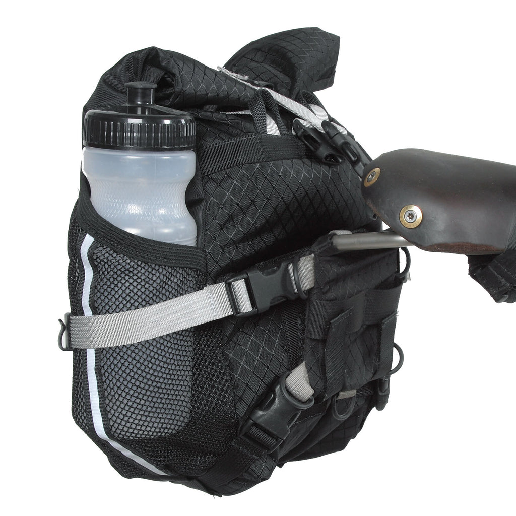 A normal-size bike bottle (or other accessories) can fit in the side mesh pocket.