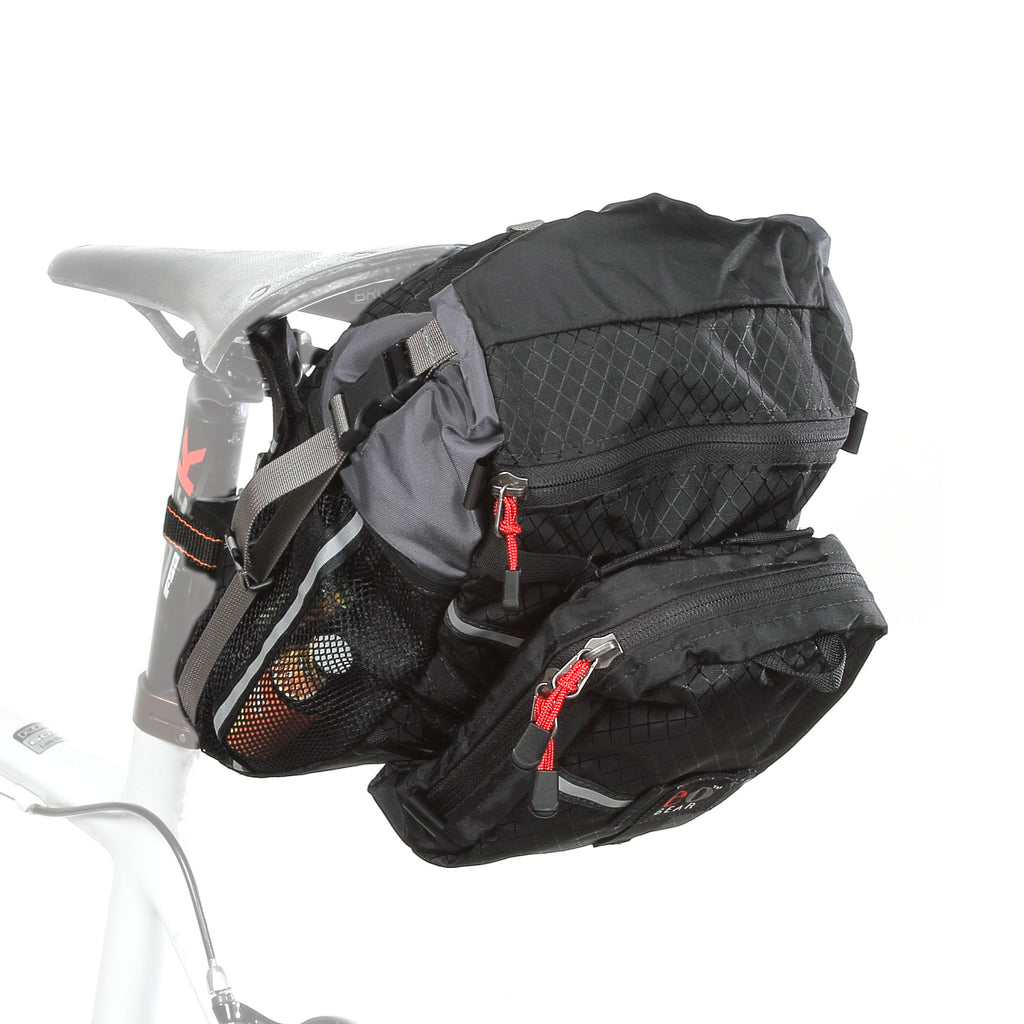 The optional Piggy-back Pocket 2.5 can be added to the back for additional capacity. It attaches in four points. When attaching it, your bag to tire clearance will be decreased.