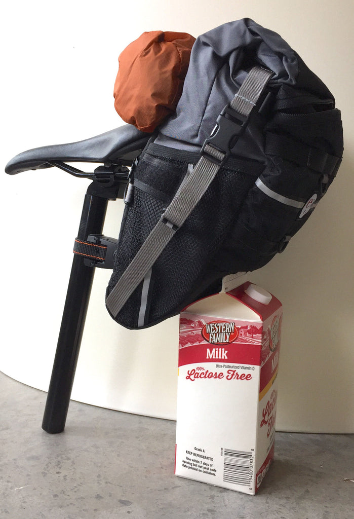 Per the request of a customer, this reference photo: 9.0 bag & a 1/2-gal milk. The 10.0 is similar in size except the 10.0 uses a different seatpost adapter.