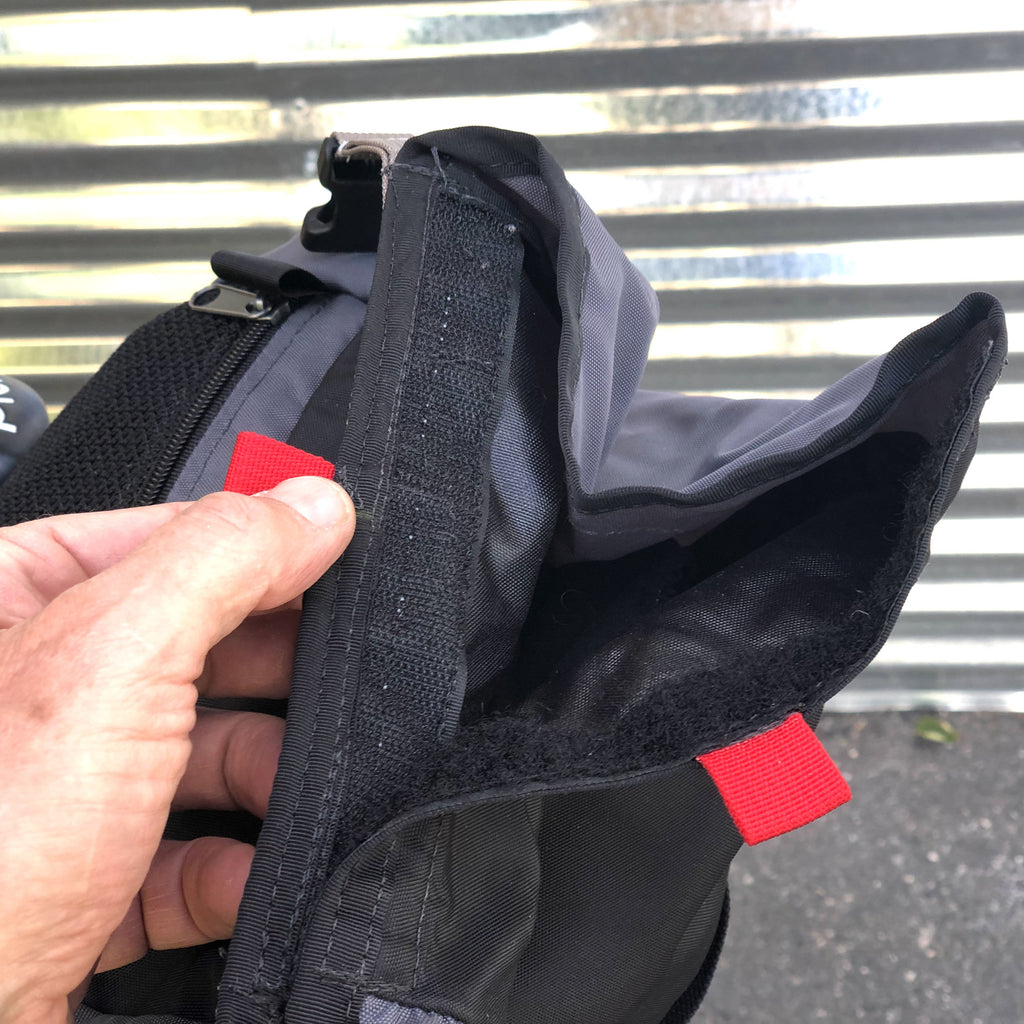 The top of the bag closes with Velcro.