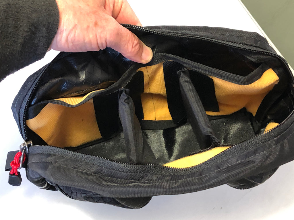 INSTRUCTIONS: Place the one or two dividers near the center of the pouch to keep the bag from sagging while mounted in the sideways position.