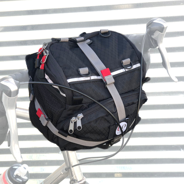 6.8 bag mounted to the Clamp-on Handlebar Bracket