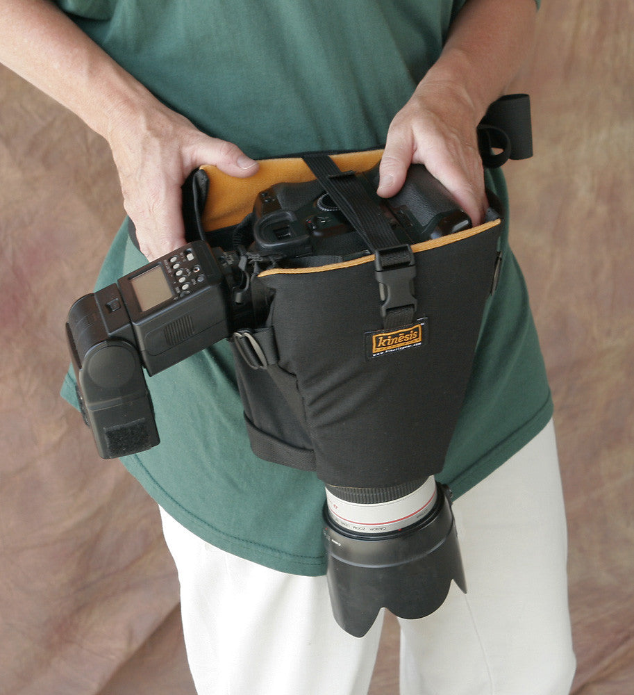 C447 with a camera body and shoe-mount flash attached (rotate camera body as shown).
