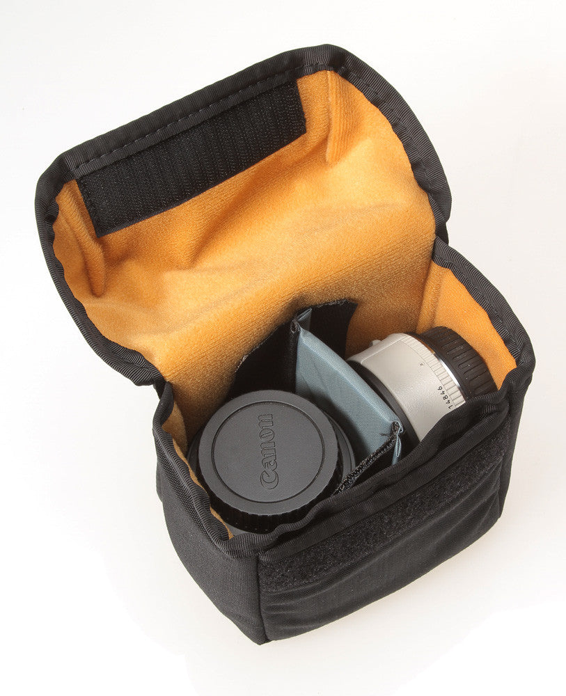 The V020 divider (now in black) attaches to one side of the pouch for two very small lenses or teleconverters.
