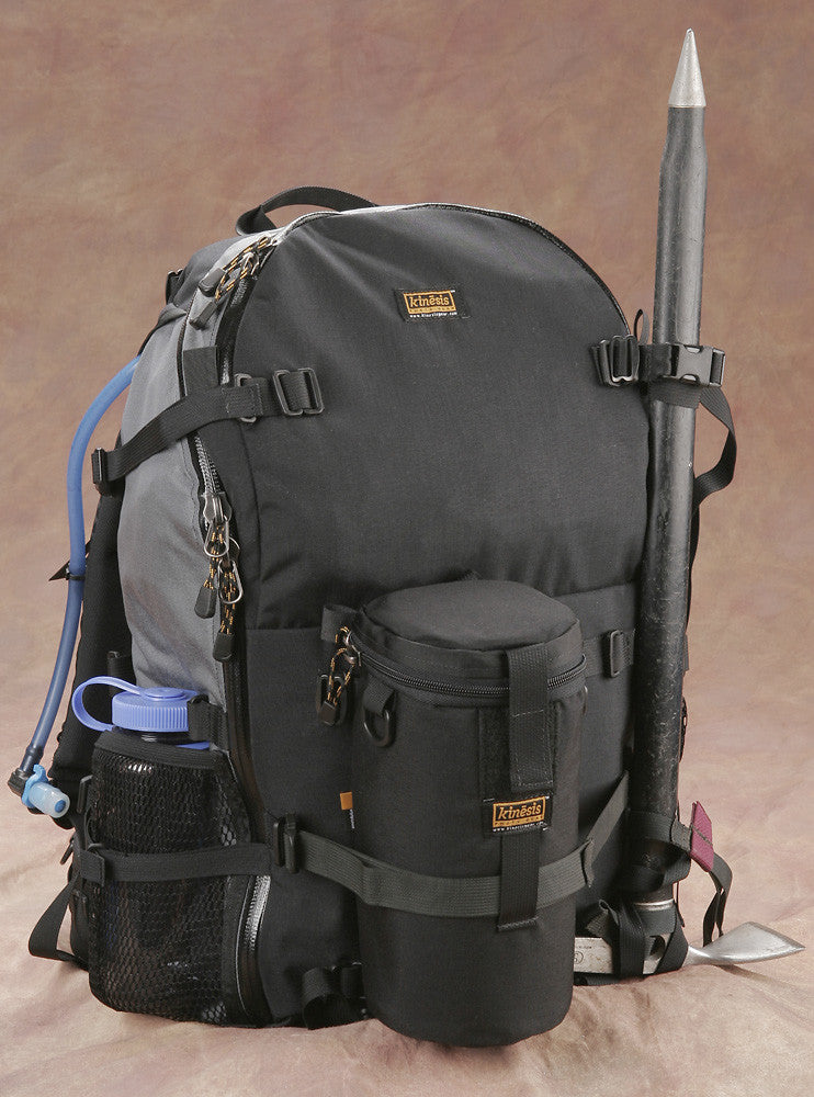 Pack with ice ax & lens pouch attached. Y305 stabilizing strap surrounds the lens pouch.