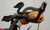 Single strap securing a 2L stuff sack to a pair of aerobars. 